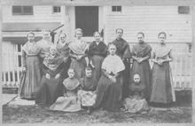 SA0146 - Photo shows 13 women and girls, including Julia Lincoln, Ann Offord, Martha Anderson, Maria Blow, and Eliza Rayson of the North family.
